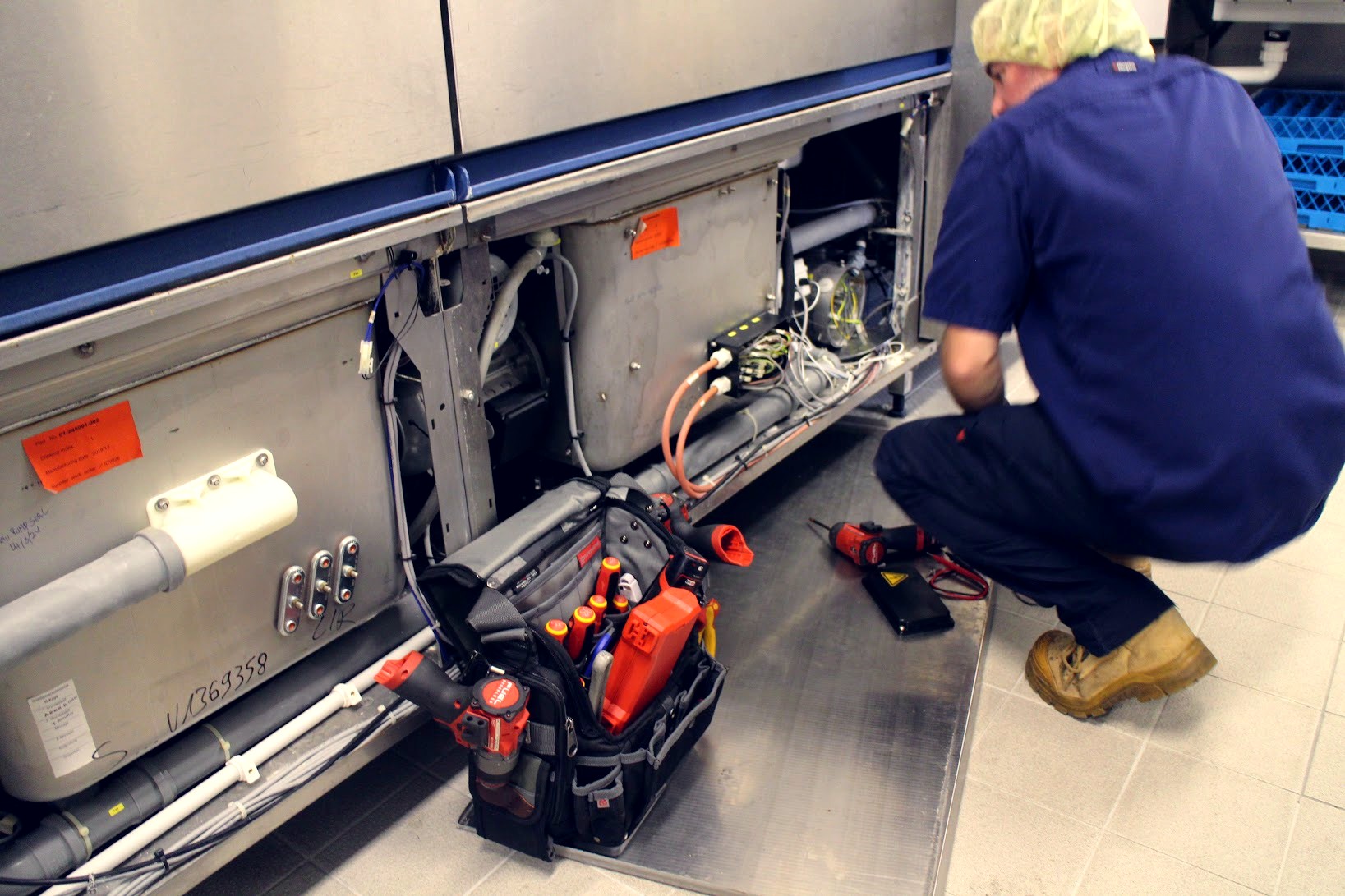 CHEFTECH technician performing equipment breakdowns on commercial kitchen equipment on the Sunshine Coast